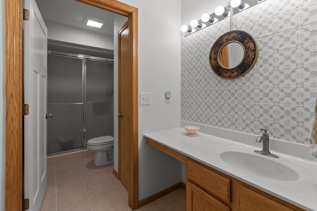 91 Potawatomi Rd Unit N-2, Williams Bay, WI 53191 - full bath with tile patterned floors, a stall shower, toilet, and vanity