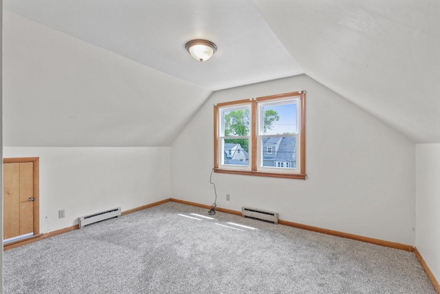 3612 N 57th St, Milwaukee, WI 53216 - additional living space with a baseboard radiator, carpet, baseboards, and lofted ceiling