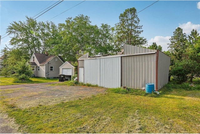 201 5th St, Centuria, WI 54824 - view of grassy yard with an outbuilding