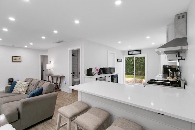539 Highland Rd, Williams Bay, WI 53191 - living room featuring light wood finished floors, recessed lighting, and baseboards