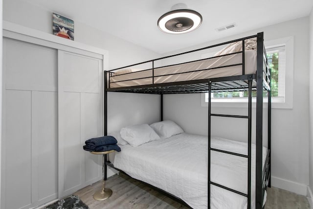 539 Highland Rd, Williams Bay, WI 53191 - bedroom featuring wood finished floors and baseboards