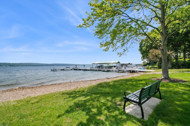 539 Highland Rd, Williams Bay, WI 53191 - view of property's community with a dock, a lawn, and a water view
