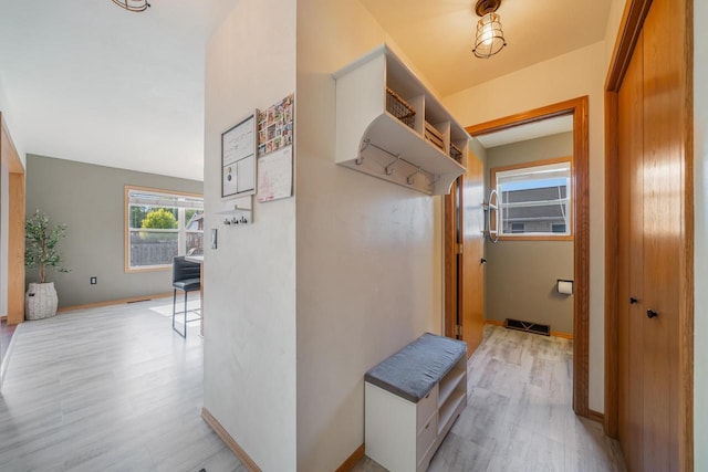 2759 Hamilton St, Oshkosh, WI 54901 - mudroom with light wood-style flooring and baseboards