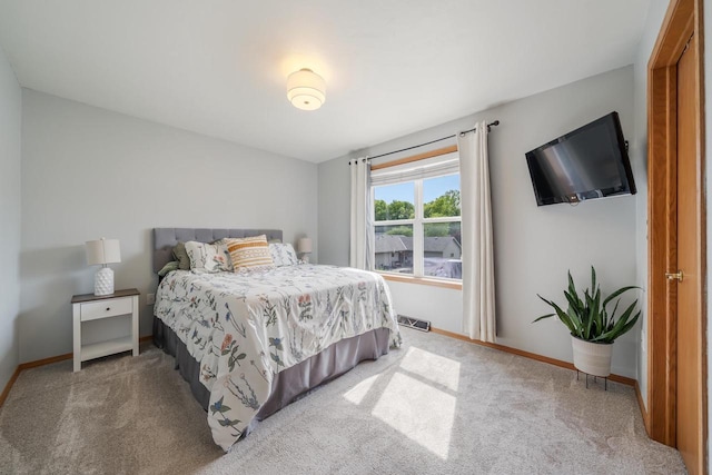 2759 Hamilton St, Oshkosh, WI 54901 - bedroom with carpet flooring and baseboards