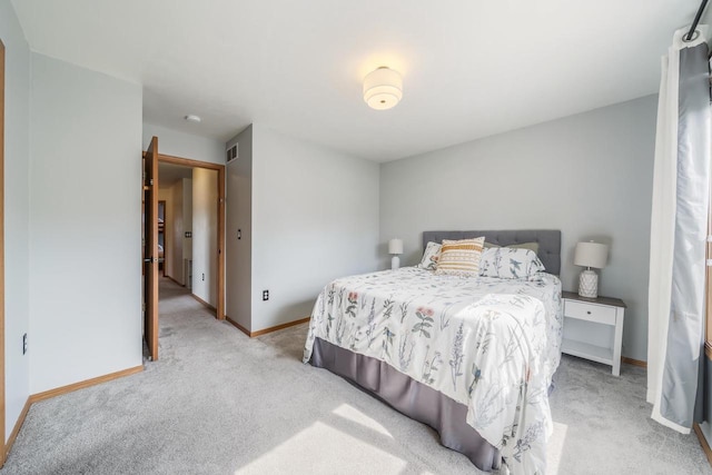2759 Hamilton St, Oshkosh, WI 54901 - bedroom featuring light carpet and baseboards