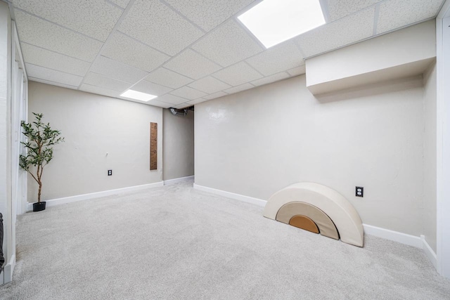 2759 Hamilton St, Oshkosh, WI 54901 - finished below grade area featuring a drop ceiling, baseboards, and carpet floors