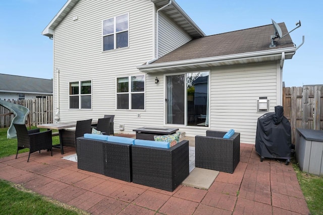 2759 Hamilton St, Oshkosh, WI 54901 - rear view of property featuring an outdoor hangout area, a patio area, and roof with shingles