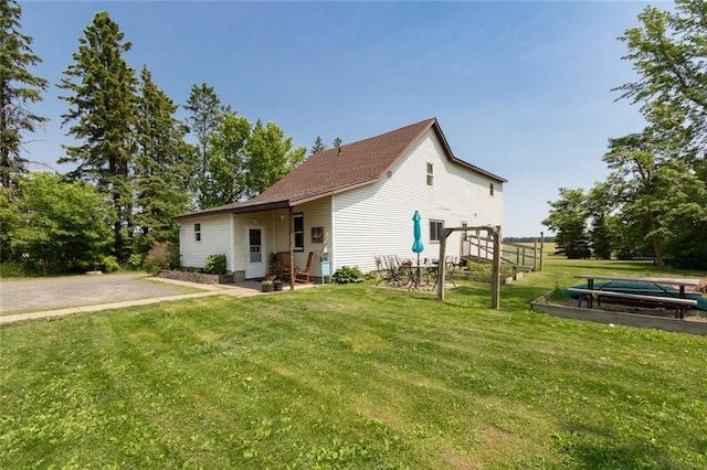 1843 190th St, Centuria, WI 54824 - view of home's exterior featuring a yard