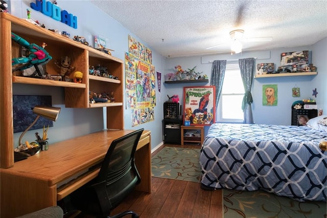 1843 190th St, Centuria, WI 54824 - bedroom with a textured ceiling, dark wood finished floors, and ceiling fan