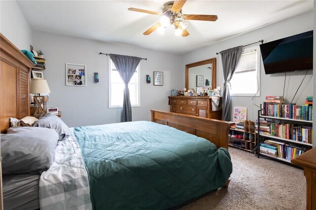 1843 190th St, Centuria, WI 54824 - carpeted bedroom with a ceiling fan