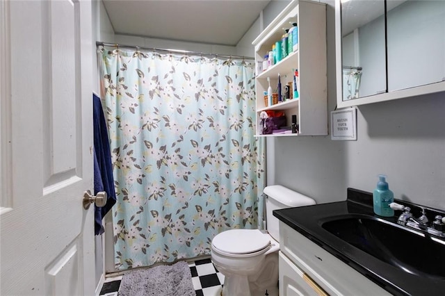 1843 190th St, Centuria, WI 54824 - bathroom with vanity, toilet, a shower with shower curtain, and tile patterned floors