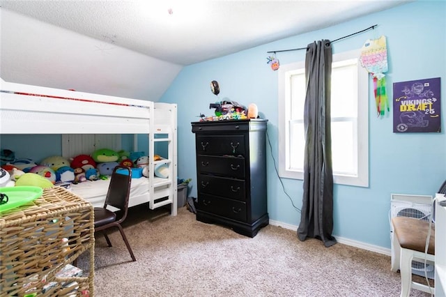1843 190th St, Centuria, WI 54824 - bedroom with light carpet, lofted ceiling, and baseboards