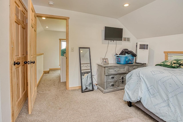 811 E Maple St, Lancaster, WI 53813 - bedroom with light colored carpet, recessed lighting, vaulted ceiling, and baseboards