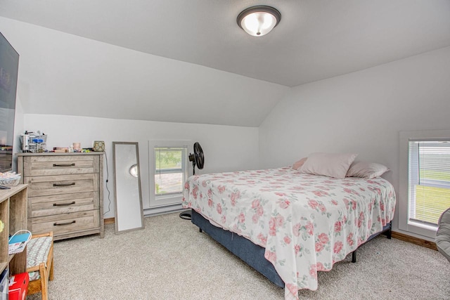 811 E Maple St, Lancaster, WI 53813 - bedroom with lofted ceiling, light carpet, and baseboards