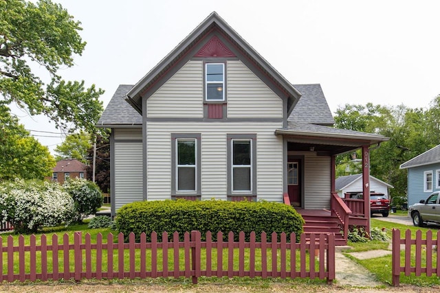 912 N Richmond St, Appleton, WI 54911 - bungalow-style home with a porch and roof with shingles