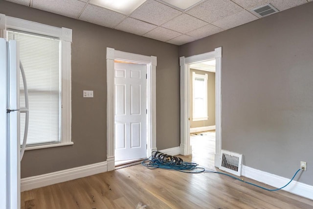912 N Richmond St, Appleton, WI 54911 - entrance foyer featuring baseboards, wood finished floors, and a paneled ceiling