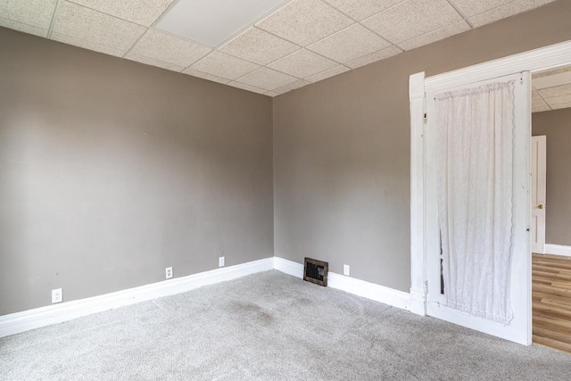 912 N Richmond St, Appleton, WI 54911 - empty room with a drop ceiling, carpet flooring, and baseboards