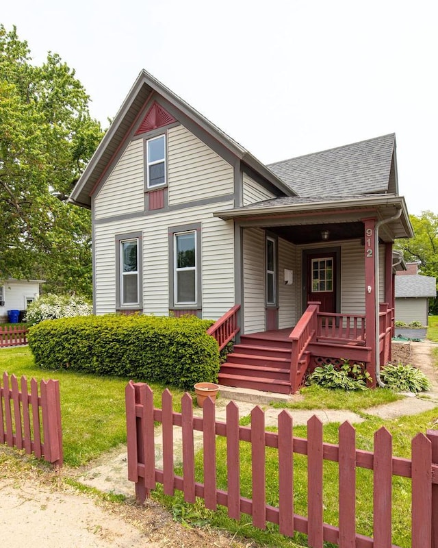 912 N Richmond St, Appleton, WI 54911 - view of front of property with covered porch and a shingled roof