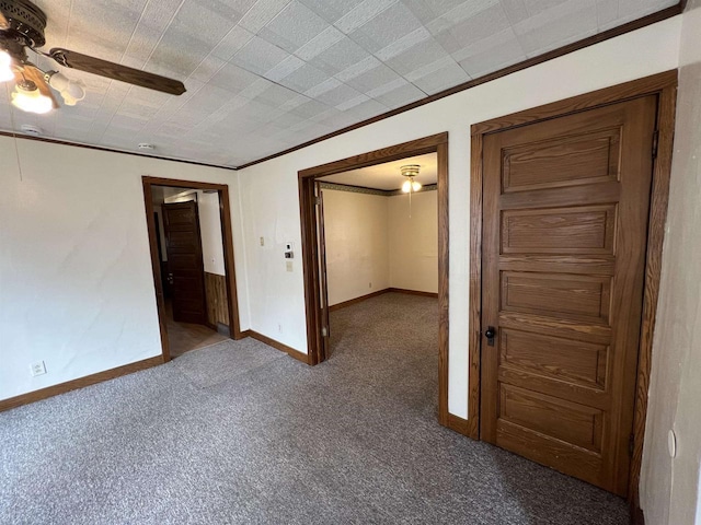 856 8th St, Beloit, WI 53511 - spare room with carpet flooring, ceiling fan, baseboards, and crown molding
