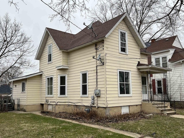 856 8th St, Beloit, WI 53511 - view of side of home with a yard