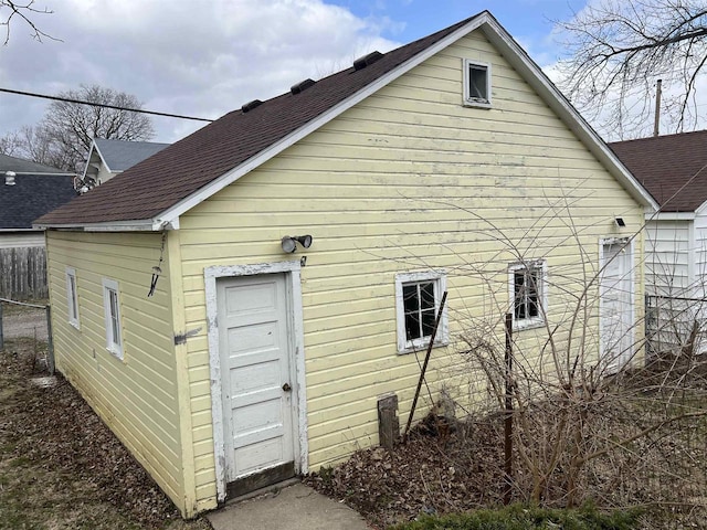 856 8th St, Beloit, WI 53511 - view of side of property with roof with shingles
