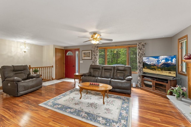 9432 James Ave, Sparta, WI 54656 - living room featuring a chandelier, hardwood / wood-style flooring, and ceiling fan