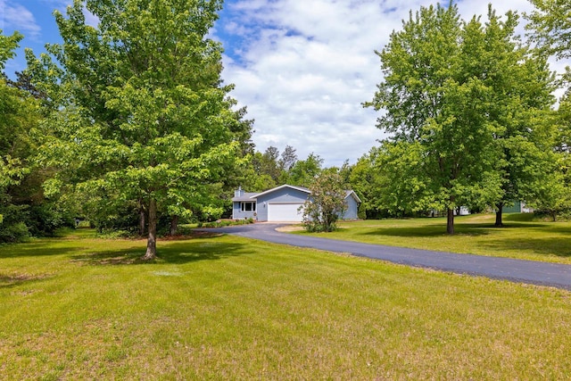 9432 James Ave, Sparta, WI 54656 - obstructed view of property featuring a front yard