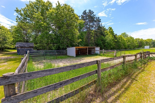 9432 James Ave, Sparta, WI 54656 - view of yard featuring an outdoor structure, an exterior structure, and a view of rural / pastoral area