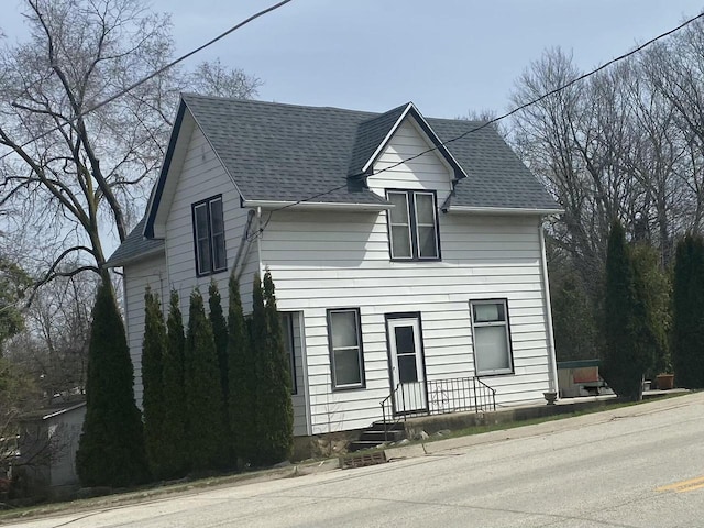 1810 Washington Ave, Cedarburg, WI 53012 - view of front facade with roof with shingles