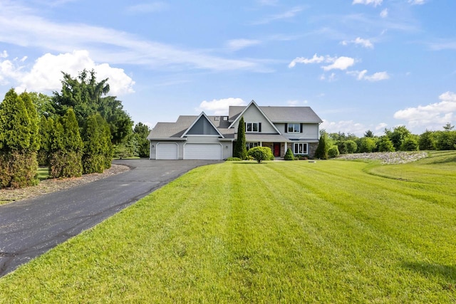 S38W32310 Green Briar Rd, Waukesha, WI 53189 - view of front of house with an attached garage, driveway, and a front yard