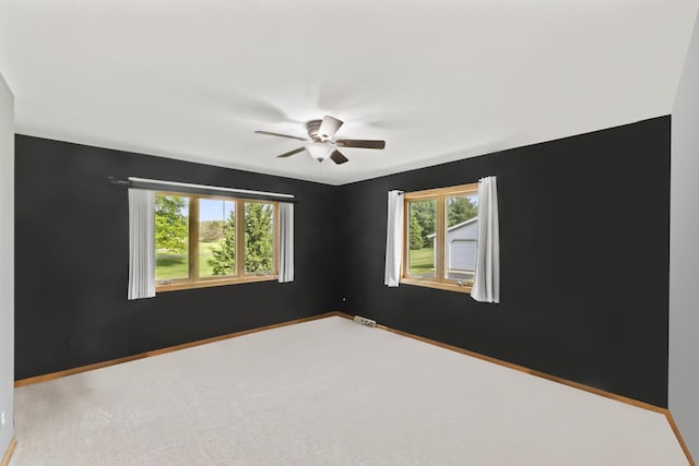 S38W32310 Green Briar Rd, Waukesha, WI 53189 - unfurnished room featuring carpet, a ceiling fan, and baseboards