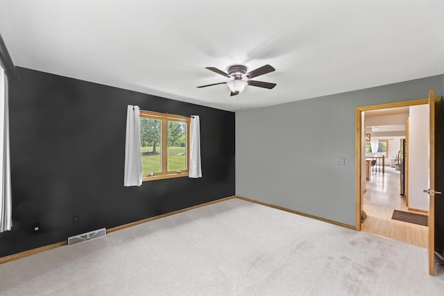 S38W32310 Green Briar Rd, Waukesha, WI 53189 - empty room with carpet, ceiling fan, and baseboards