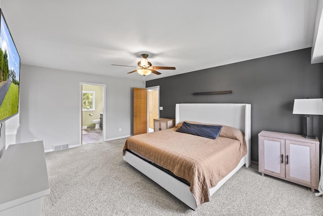 S38W32310 Green Briar Rd, Waukesha, WI 53189 - carpeted bedroom featuring baseboards, ensuite bathroom, and a ceiling fan