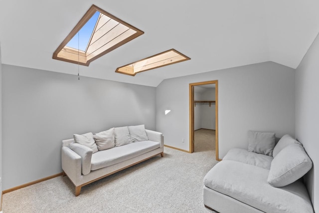 S38W32310 Green Briar Rd, Waukesha, WI 53189 - carpeted living area with a skylight, vaulted ceiling, and baseboards