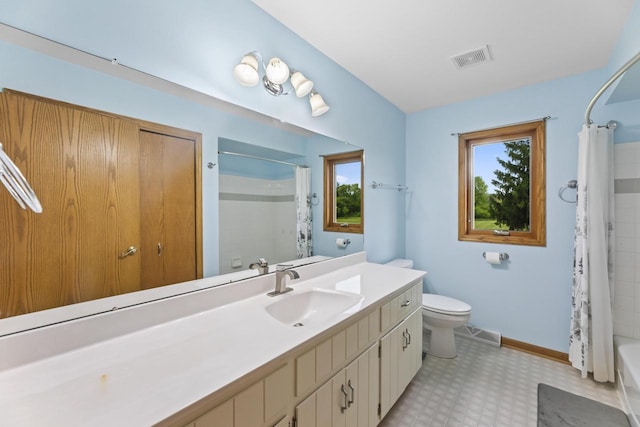S38W32310 Green Briar Rd, Waukesha, WI 53189 - bathroom with toilet, plenty of natural light, tile patterned floors, and vanity
