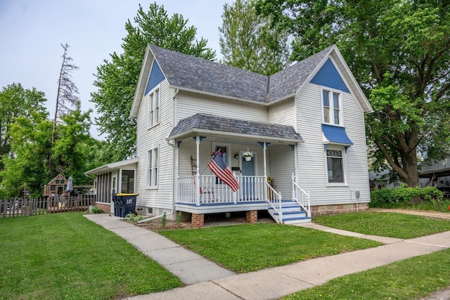 808 E State St, Mauston, WI 53948 - view of front of property with a porch and roof with shingles