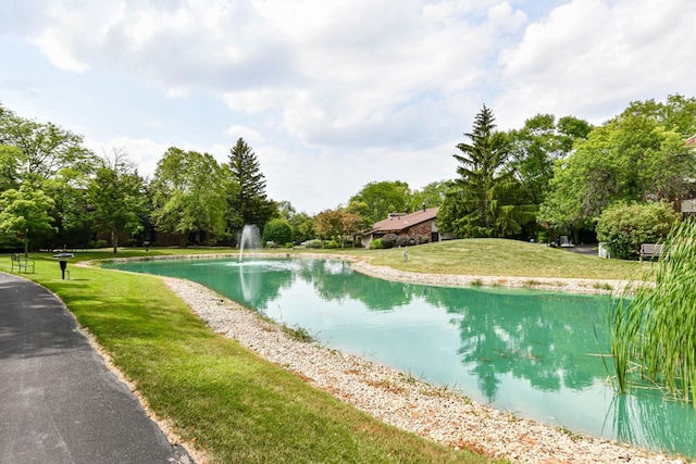 2260 W Good Hope Rd Unit 129, Glendale, WI 53209 - view of swimming pool featuring a yard and view of scattered trees