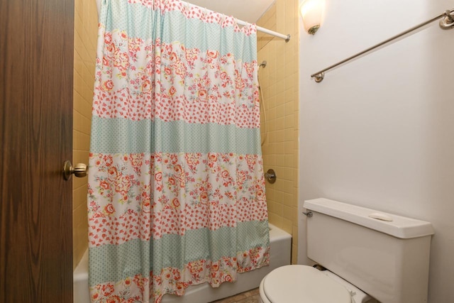 2260 W Good Hope Rd Unit 129, Glendale, WI 53209 - bathroom with shower / bathtub combination with curtain and toilet