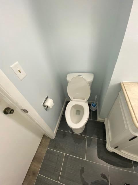 4265 S Nicholson Ave, Saint Francis, WI 53235 - bathroom with toilet, tile patterned floors, and baseboards