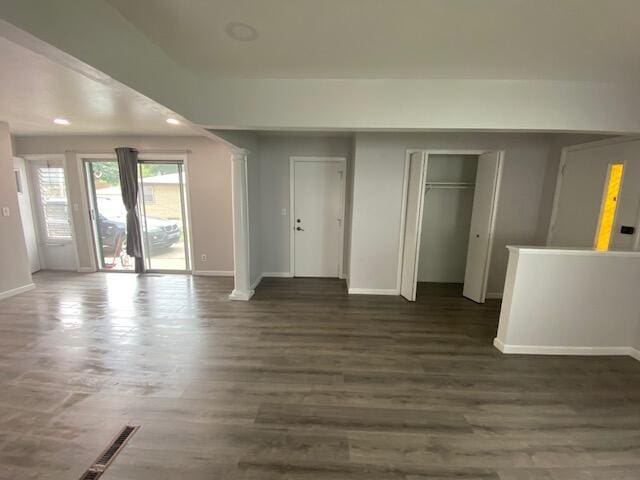 4265 S Nicholson Ave, Saint Francis, WI 53235 - unfurnished living room featuring baseboards and wood finished floors