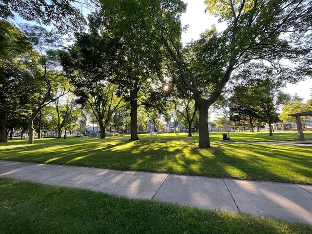 909 College Ave, Racine, WI 53403 - surrounding community with a lawn