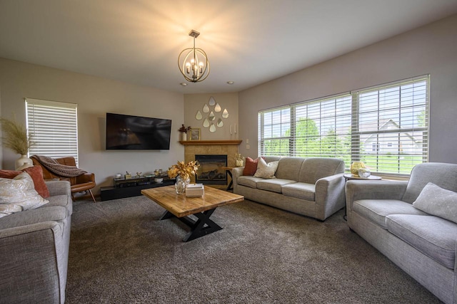 5278 W Highlands Ct, Franklin, WI 53132 - living area featuring a chandelier, a tile fireplace, and carpet floors