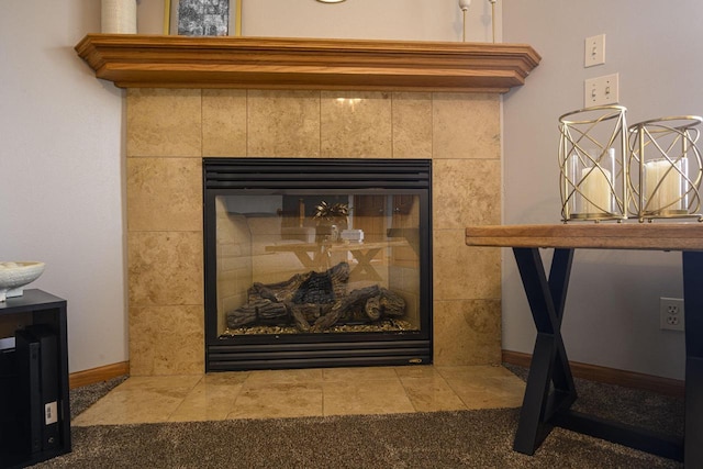 5278 W Highlands Ct, Franklin, WI 53132 - detailed view of a tiled fireplace, baseboards, and carpet floors