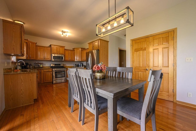 5278 W Highlands Ct, Franklin, WI 53132 - dining area featuring hardwood / wood-style flooring and baseboards