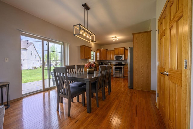 5278 W Highlands Ct, Franklin, WI 53132 - dining space with wood-type flooring