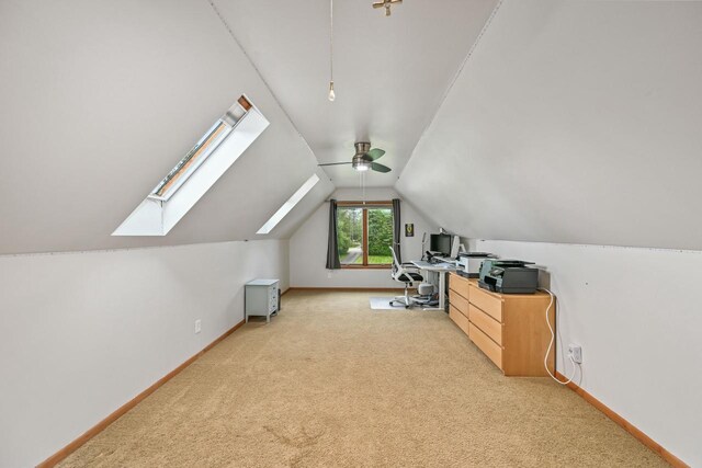 1441 W County Line Rd, River Hills, WI 53217 - office space featuring light colored carpet, a skylight, vaulted ceiling, and ceiling fan