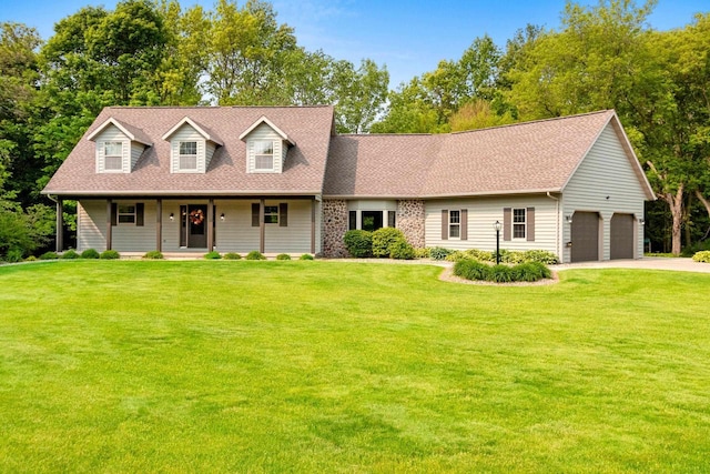2977 Ruby Ridge Ct, Green Bay, WI 54313 - cape cod home featuring concrete driveway, covered porch, a front lawn, and an attached garage