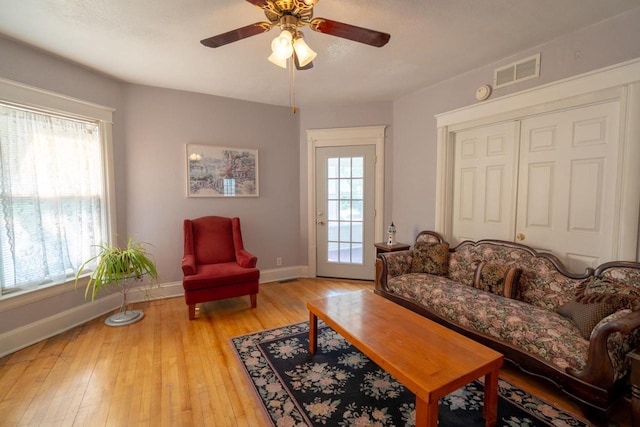 643 Park Ave, Beloit, WI 53511 - living room with baseboards, ceiling fan, and light wood-style flooring