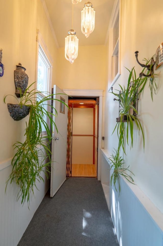643 Park Ave, Beloit, WI 53511 - hall with a chandelier and crown molding