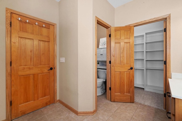 4017 Sandhill Dr, Janesville, WI 53546 - corridor with light tile patterned floors and light colored carpet